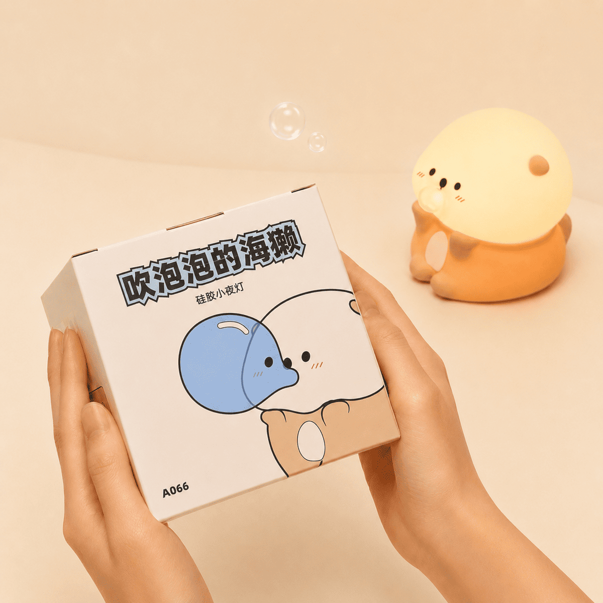 Veilleuse bébé loutre boîte et produit - mylumiz.com