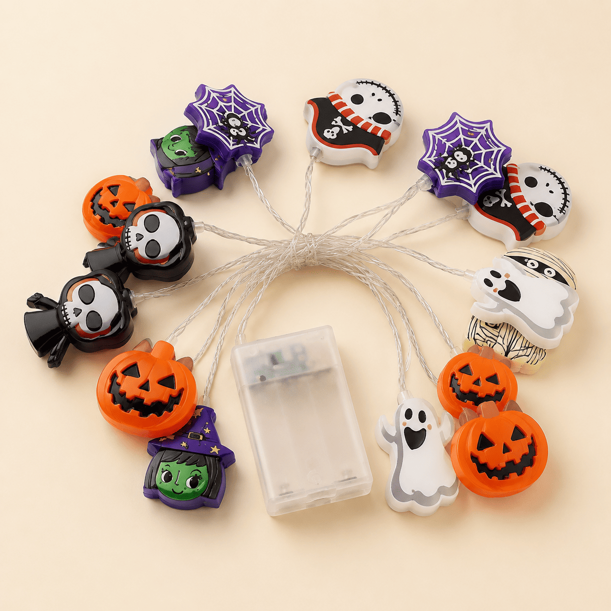 Guirlande lumineuse Halloween avec boîtier à piles sur fond beige