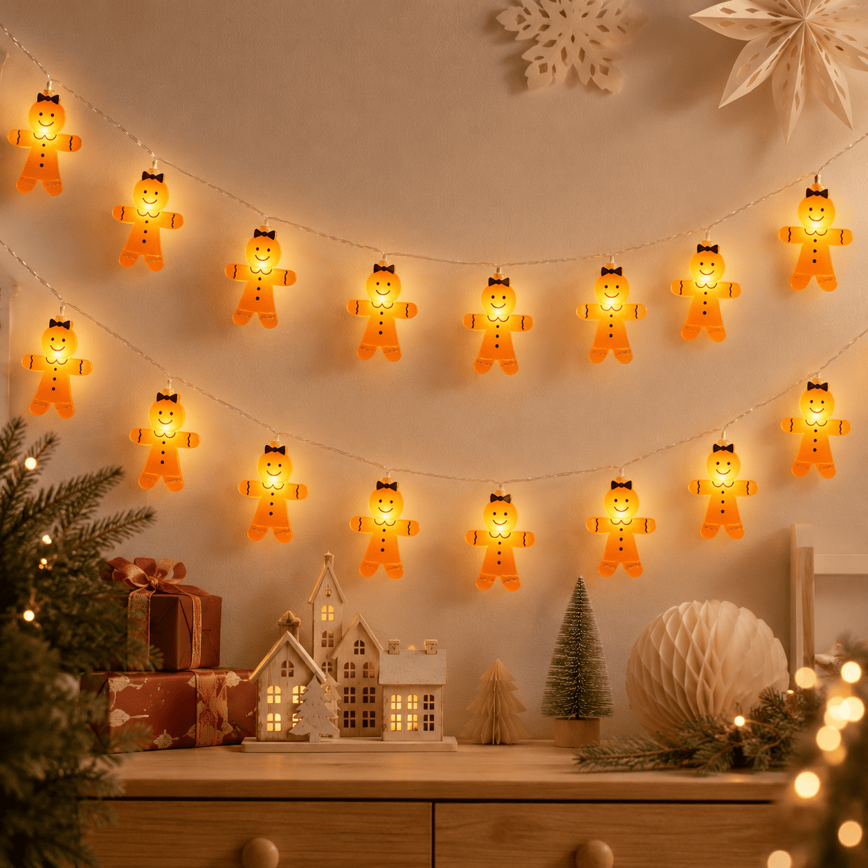 Guirlande lumineuse de Noël pain d’épices avec nœuds dans une chambre d’enfant décorée