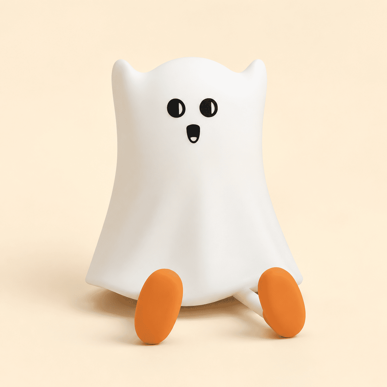 Petite veilleuse fantôme blanche avec pieds orange sur fond beige