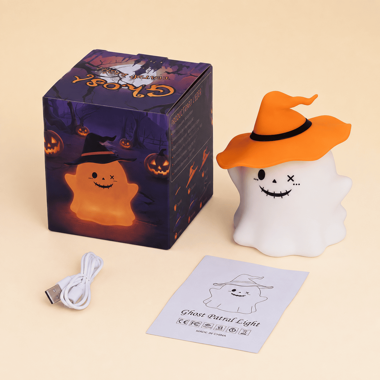 Veilleuse fantôme sorcière orange avec boîte, notice et câble USB